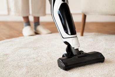 vacuum-cleaning-a-rug-on-the-floor-2026-03-18-13-42-11-utc